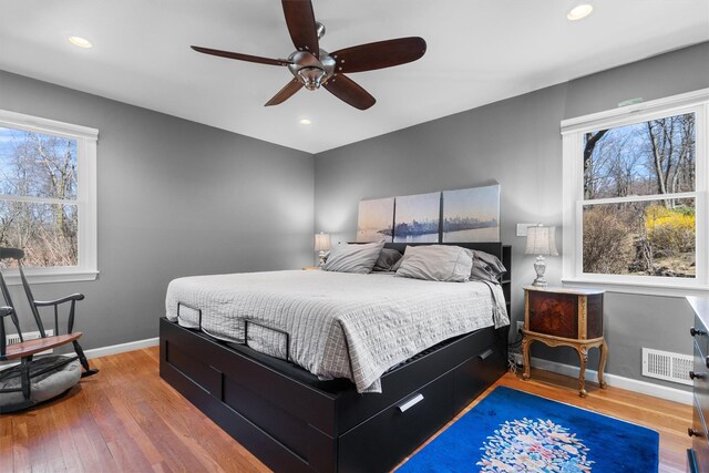 21 Glengary Rd, Croton-On-Hudson, NY 10520 - bedroom with visible vents, multiple windows, baseboards, and wood finished floors