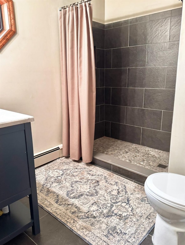 61 Mount View Estates Rd, Ashland, NY 12407 - full bath with baseboard heating, a shower stall, vanity, and tile patterned floors