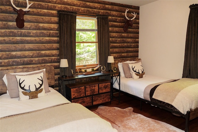 61 Mount View Estates Rd, Ashland, NY 12407 - bedroom with wood finished floors and rustic walls