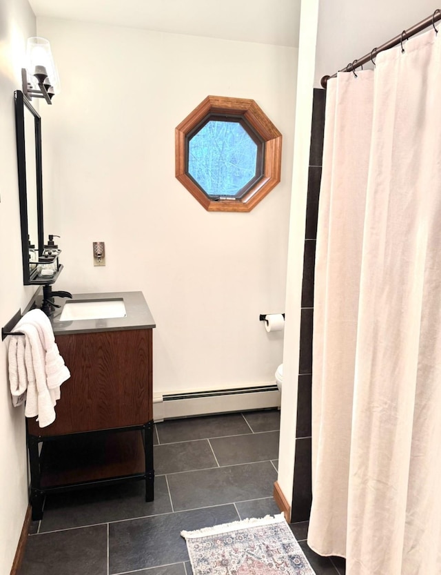 61 Mount View Estates Rd, Ashland, NY 12407 - full bath with a baseboard radiator, vanity, tile patterned flooring, and a shower with shower curtain