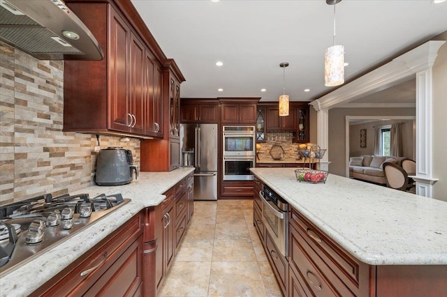 kitchen with light tile patterned flooring, crown molding, light stone countertops, under cabinet range hood, and stainless steel appliances