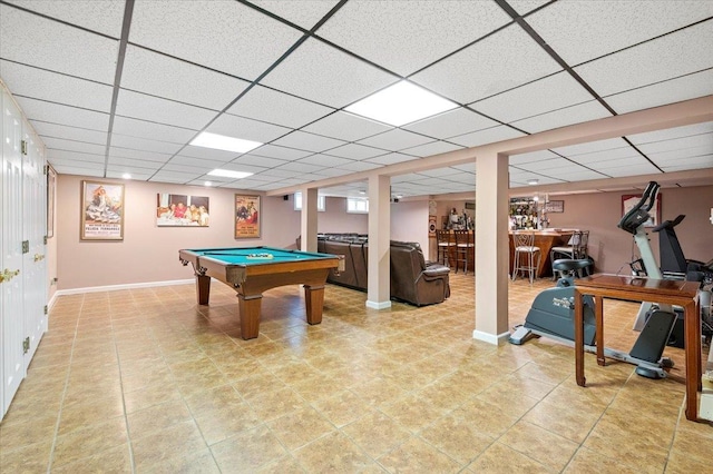 game room featuring baseboards, billiards, a drop ceiling, and bar