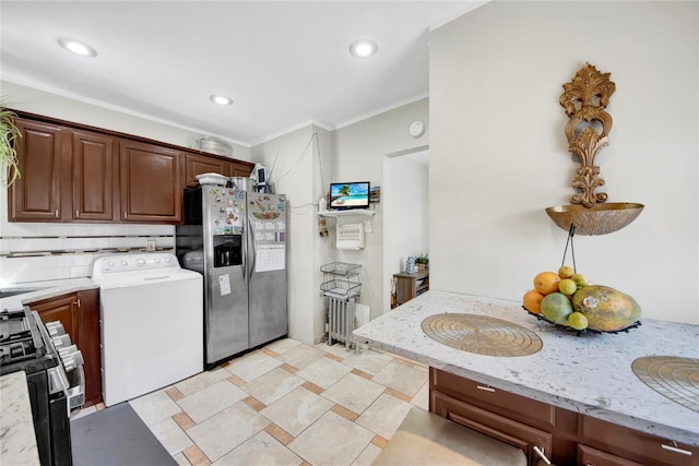820 S Oak Dr, Bronx, NY 10467 - kitchen featuring stainless steel fridge with ice dispenser, gas range oven, recessed lighting, light stone countertops, and washer / dryer