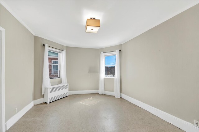 820 S Oak Dr, Bronx, NY 10467 - unfurnished room with tile patterned floors and baseboards