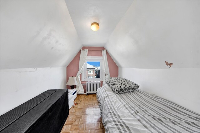 820 S Oak Dr, Bronx, NY 10467 - bedroom with radiator and lofted ceiling