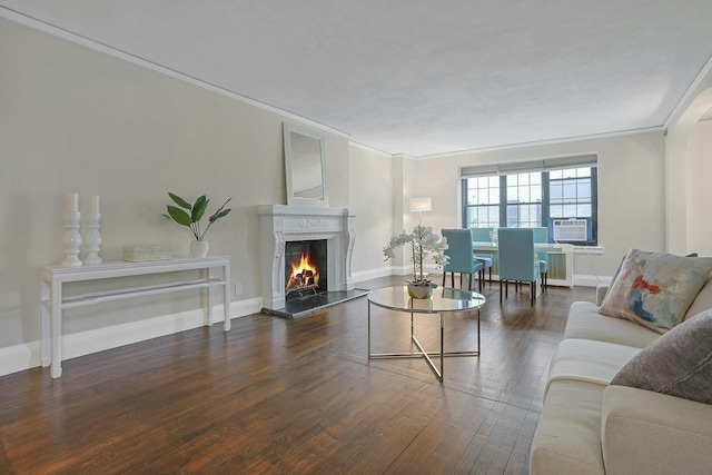 1273 N Ave Unit 1Ab, New Rochelle, NY 10804 - living area with crown molding, wood finished floors, a high end fireplace, cooling unit, and baseboards