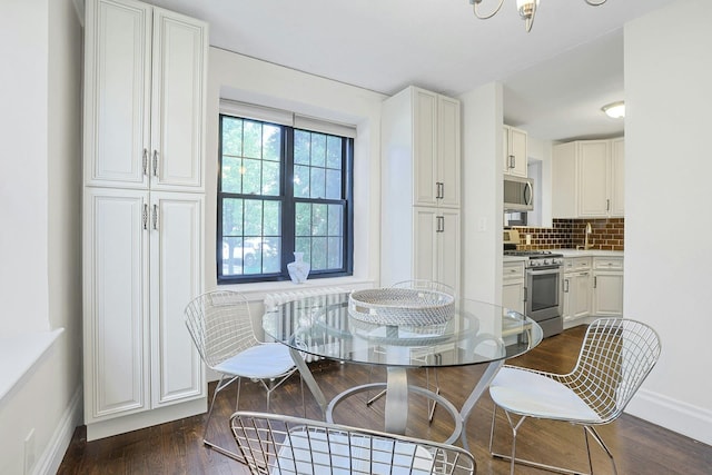 1273 N Ave Unit 1Ab, New Rochelle, NY 10804 - dining space with baseboards and dark wood-style floors