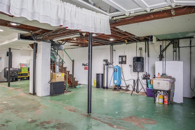 unfinished basement featuring stairway