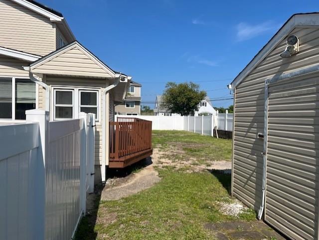 1 E Saltaire Rd, Lindenhurst, NY 11757 - view of yard with a wooden deck