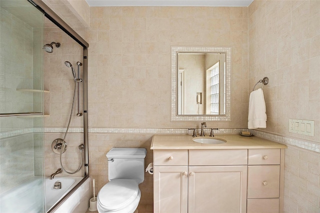 104 Grosvenor, Douglaston, NY 11363 - full bath with toilet, enclosed tub / shower combo, vanity, and tile walls