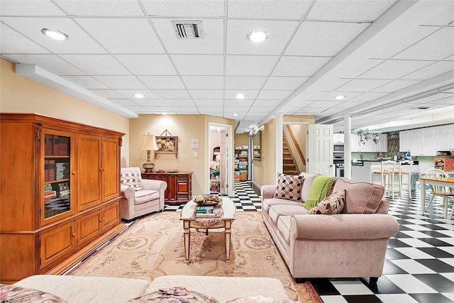 104 Grosvenor, Douglaston, NY 11363 - living area featuring recessed lighting, stairway, visible vents, and light floors