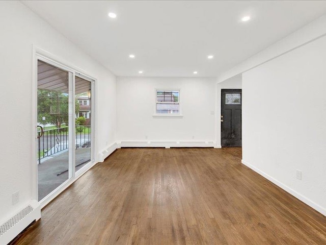 166 Sears Ave, Elmsford, NY 10523 - unfurnished room featuring wood finished floors, plenty of natural light, recessed lighting, and baseboards