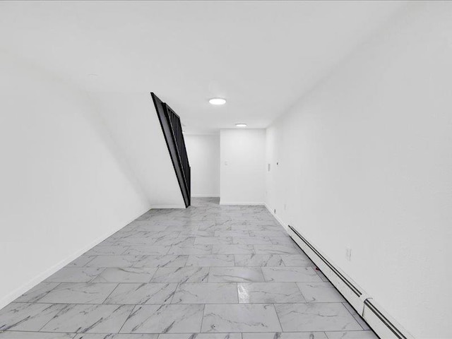 166 Sears Ave, Elmsford, NY 10523 - unfurnished room featuring a baseboard radiator, light marble finish flooring, baseboards, and recessed lighting