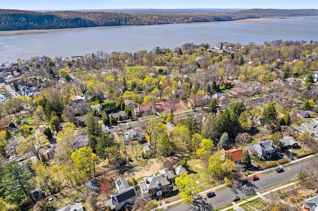 bird's eye view featuring a residential view and a water view