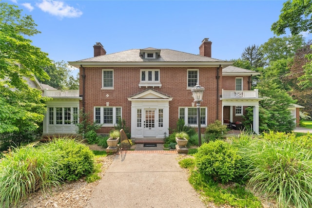 27 Calumet Ave, Hastings-On-Hudson, NY 10706 - back of property featuring a chimney and brick siding