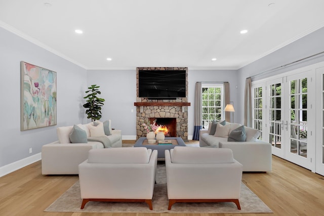 5 Briarcliff Rd, Chappaqua, NY 10514 - living room featuring ornamental molding, light wood-type flooring, recessed lighting, baseboards, and a stone fireplace