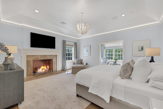 5 Briarcliff Rd, Chappaqua, NY 10514 - bedroom with a raised ceiling, a chandelier, a fireplace, and recessed lighting