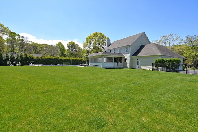 103 Silver Beech Ln, Calverton, NY 11933 - view of yard with a sunroom, fence, and a fenced in pool