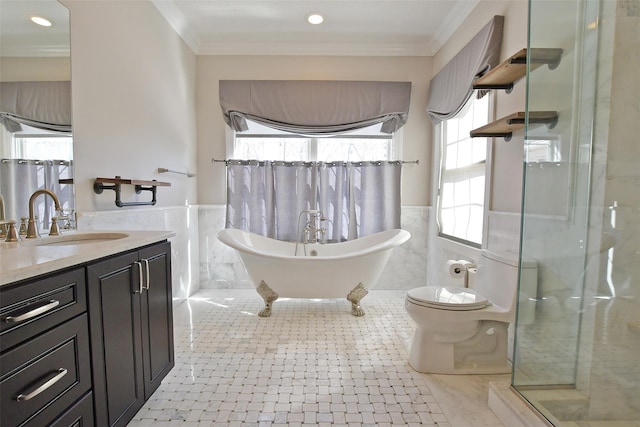103 Silver Beech Ln, Calverton, NY 11933 - full bathroom with a soaking tub, a wainscoted wall, vanity, and crown molding