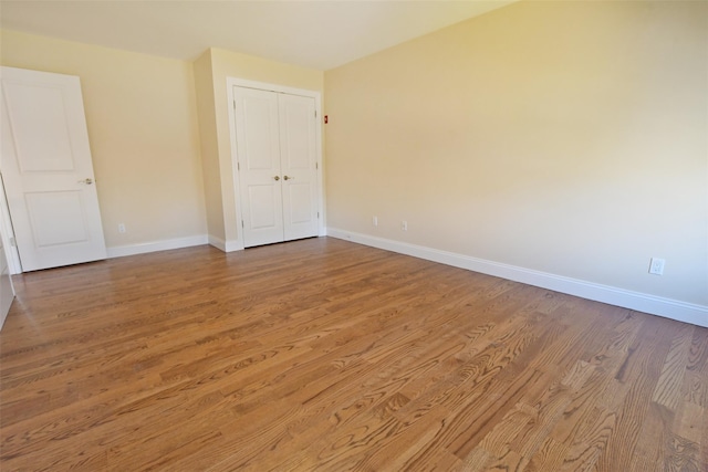 103 Silver Beech Ln, Calverton, NY 11933 - unfurnished room featuring baseboards and wood finished floors