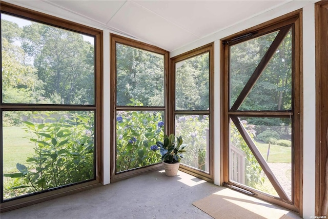 2955 Hyatt Rd, Southold, NY 11971 - unfurnished sunroom with vaulted ceiling and carpet flooring