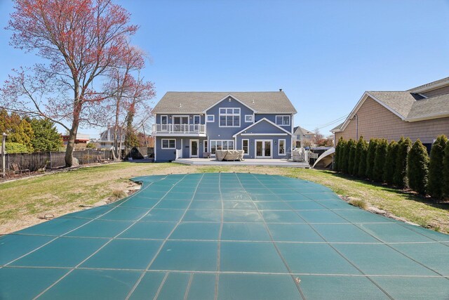 230 W Islip Rd, West Islip, NY 11795 - back of property with a balcony and a patio area