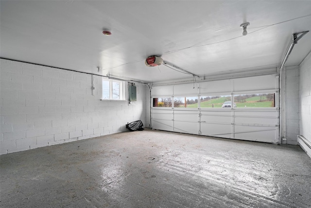 139 Cross Rd, Goshen, NY 10924 - garage featuring electric panel, a garage door opener, and concrete block wall