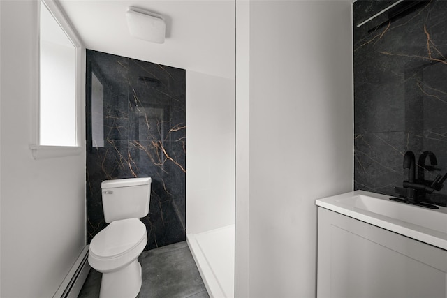 139 Cross Rd, Goshen, NY 10924 - full bath featuring a baseboard heating unit, vanity, tile walls, and toilet