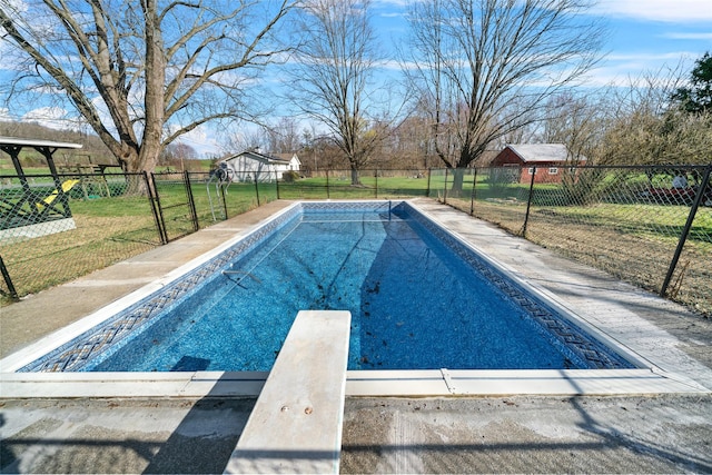 139 Cross Rd, Goshen, NY 10924 - view of swimming pool featuring a diving board, a fenced backyard, a fenced in pool, and a lawn