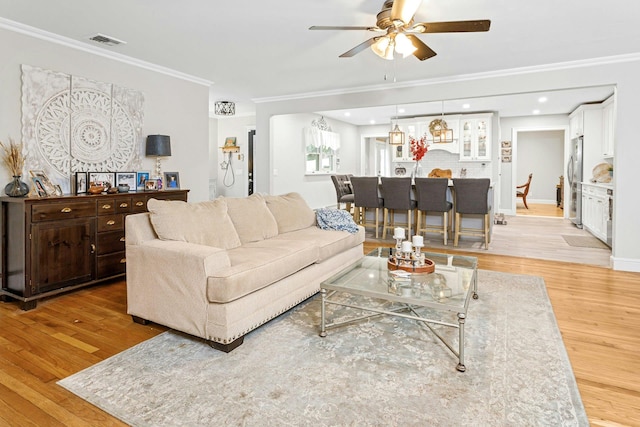 25 Macgregor Dr, Mahopac, NY 10541 - living area with a ceiling fan, light wood-style flooring, ornamental molding, and recessed lighting