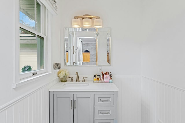 25 Macgregor Dr, Mahopac, NY 10541 - bathroom featuring a wainscoted wall, vanity, and plenty of natural light