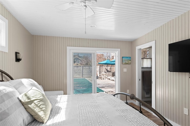110 Ocean Rd, Ocean Beach, NY 11770 - bedroom with access to outside and wood finished floors