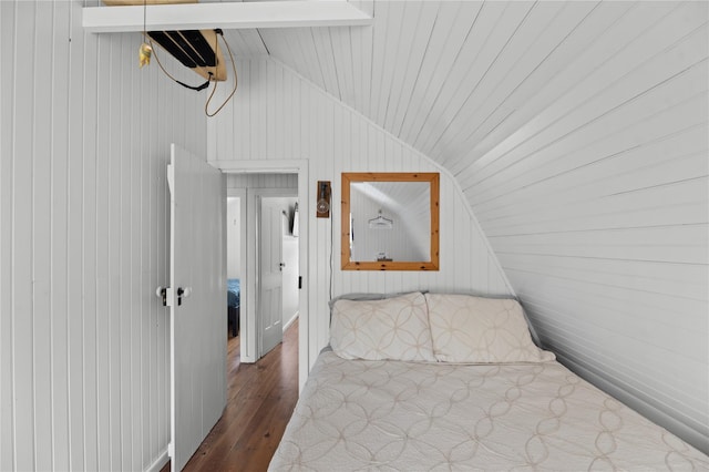 110 Ocean Rd, Ocean Beach, NY 11770 - bedroom featuring vaulted ceiling, wood finished floors, wooden walls, and wooden ceiling