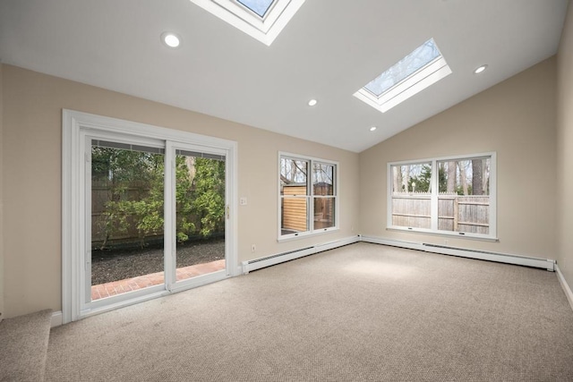unfurnished room featuring carpet flooring, recessed lighting, and lofted ceiling with skylight
