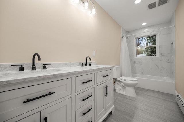 full bath with toilet, visible vents, a sink, and shower / tub combo with curtain