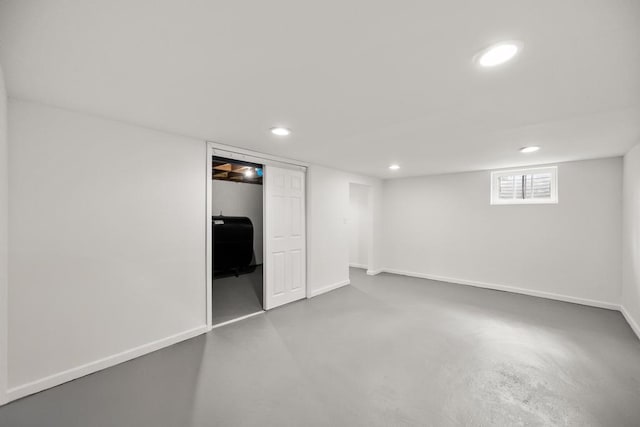 below grade area featuring baseboards, recessed lighting, and visible vents