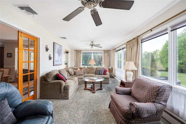 living room with a ceiling fan