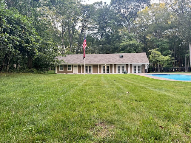 33 Bacon Rd, Saint James, NY 11780 - single story home featuring french doors, a front yard, and an outdoor pool