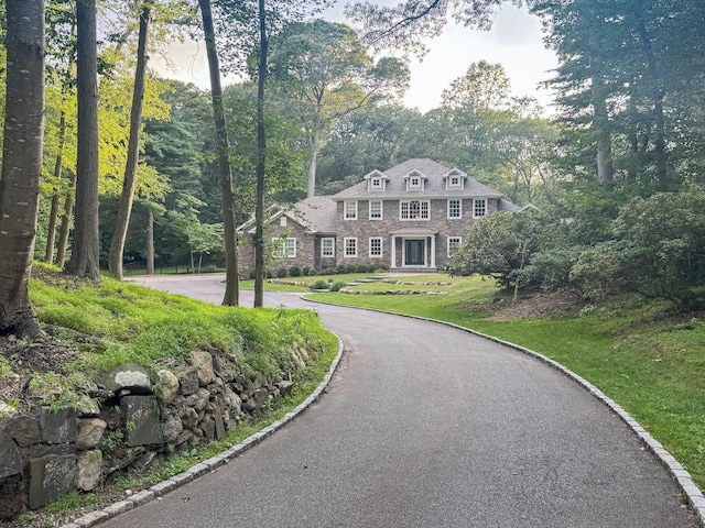 33 Bacon Rd, Saint James, NY 11780 - view of front of house featuring a front yard and driveway