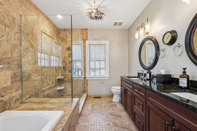 33 Bacon Rd, Saint James, NY 11780 - full bath with plenty of natural light, a shower stall, double vanity, and a garden tub