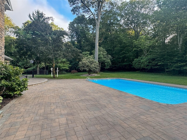 33 Bacon Rd, Saint James, NY 11780 - outdoor pool with a patio and a lawn