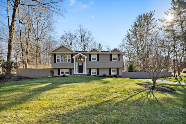 3 Bell Ct, Airmont, NY 10901 - raised ranch with a front yard and fence