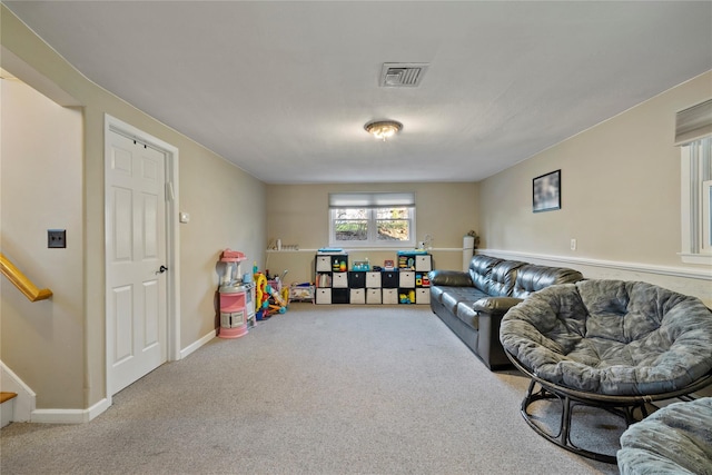 3 Bell Ct, Airmont, NY 10901 - living area with visible vents, baseboards, carpet, and stairs