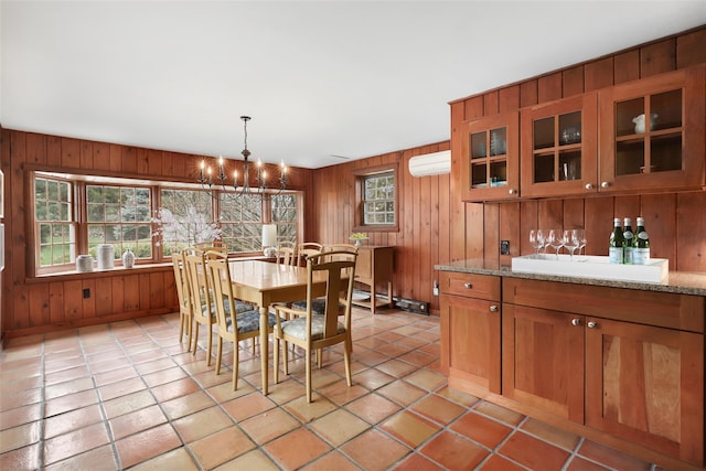 29 Oscaleta Rd, South Salem, NY 10590 - dining room with wood walls, an AC wall unit, and a chandelier