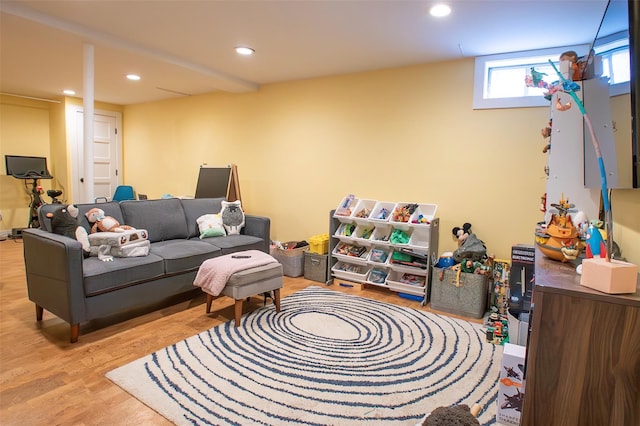 living room featuring recessed lighting and wood finished floors