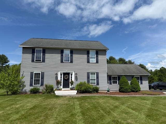 49 Macintosh Dr, Hudson, NY 12534 - colonial house featuring a front yard