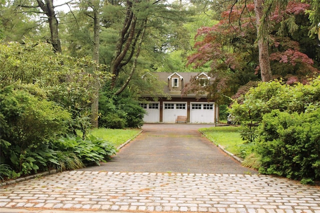 7 Locust Ln, Glen Head, NY 11545 - view of front of property featuring a garage
