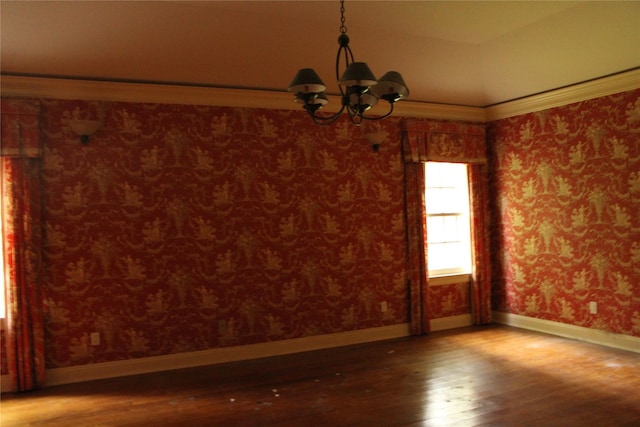 7 Locust Ln, Glen Head, NY 11545 - empty room with hardwood / wood-style floors, a chandelier, and baseboards