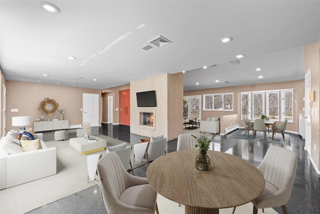18 Millbank Rd, Poughkeepsie, NY 12603 - dining room with recessed lighting, a fireplace, and granite floors