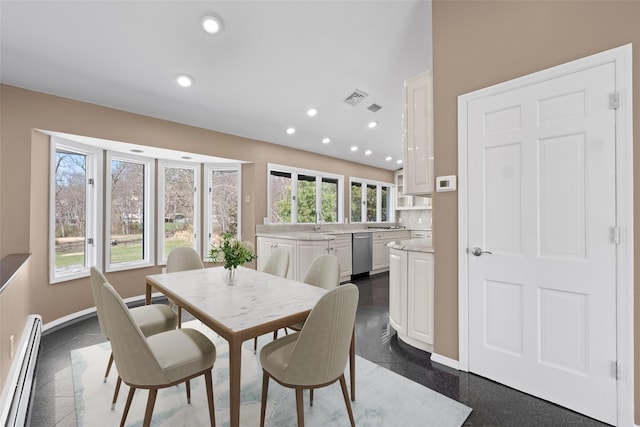 18 Millbank Rd, Poughkeepsie, NY 12603 - dining room featuring baseboard heating, granite floors, and recessed lighting